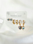 white heart eye earrings