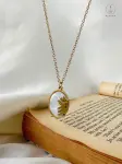 half white sun necklace