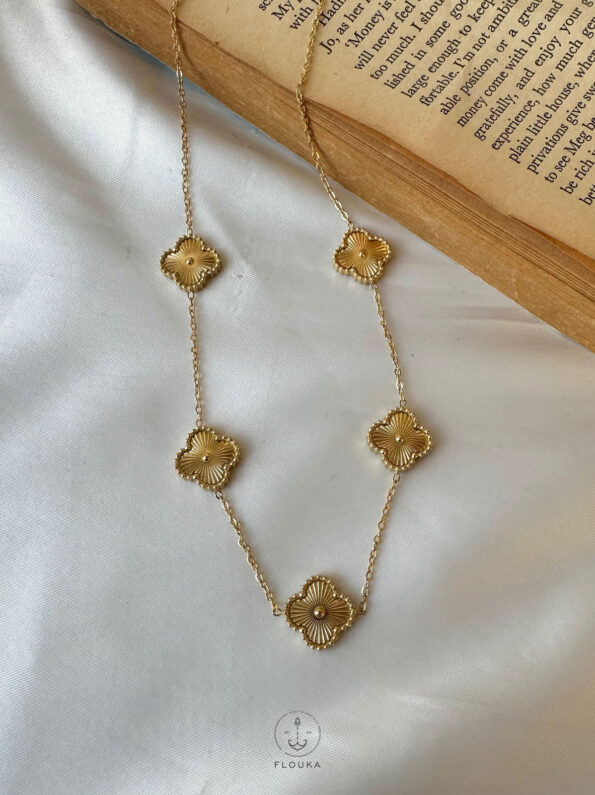 many gold vancleef necklace