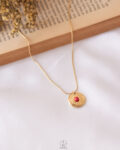 red sun necklace