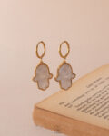 double face white palm earrings