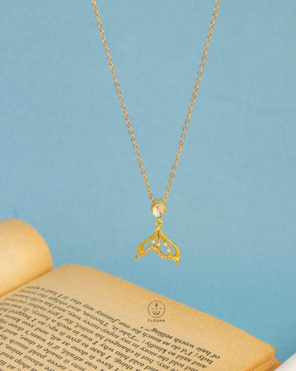 white straus whale tail necklace