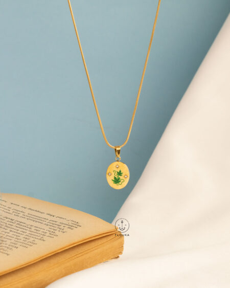 green plant pint gold necklace