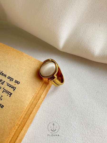 white cat eye gold ring