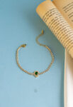 tiny green tennis bracelet