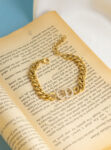 gold straus cd bracelet