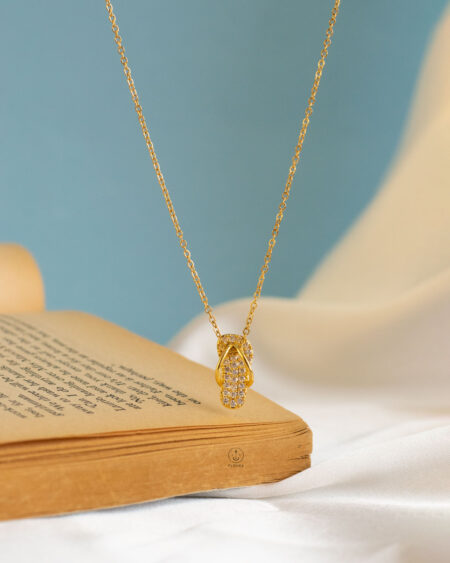 straus gold sliper necklace