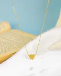 cartier gold heart necklace
