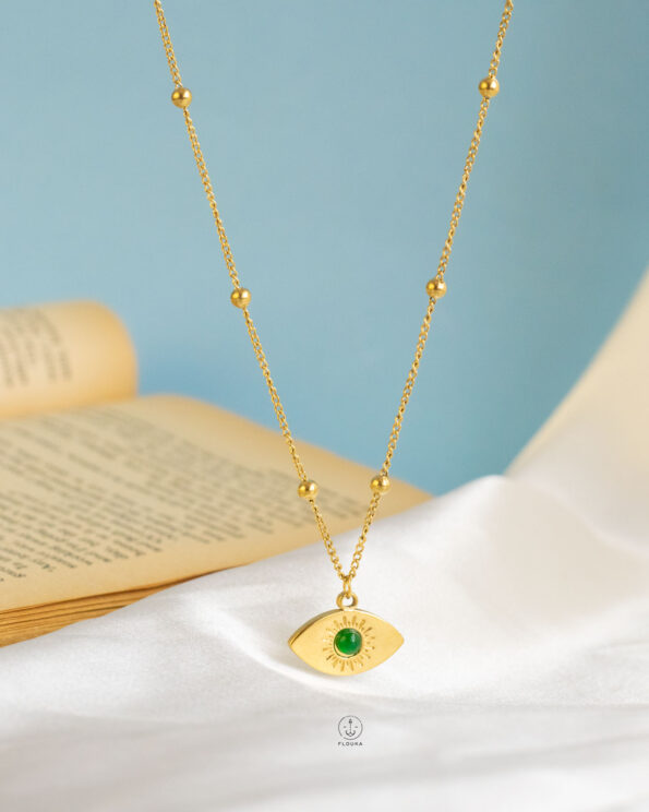 green eye gold necklace