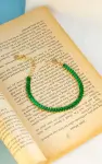 green tennis bracelet