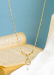 gold straus cd necklace