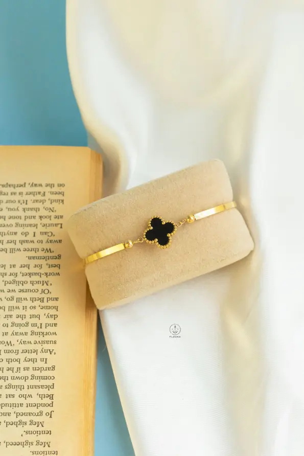 black vancleef gold bracelet