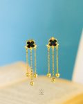 tiny black vancleef earrings