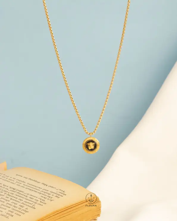 tiny versace necklace