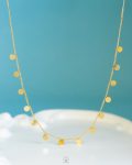 many tiny gold circles necklace