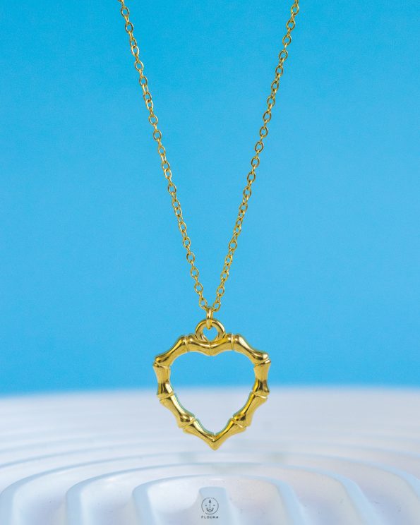 gold bone empty heart necklace