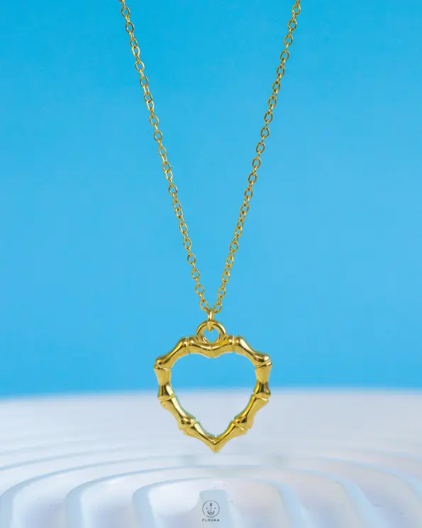 gold bone empty heart necklace