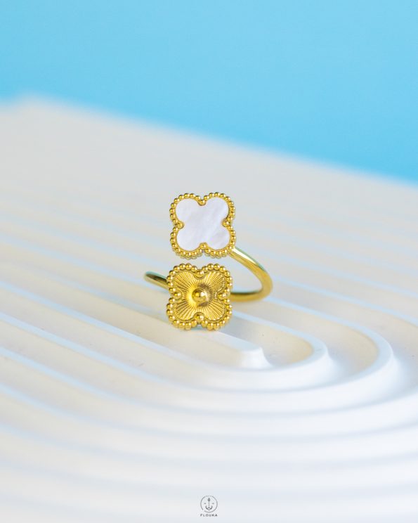 gold vancleef ring in white