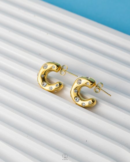 gold C straus earrings