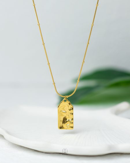 face gold necklace