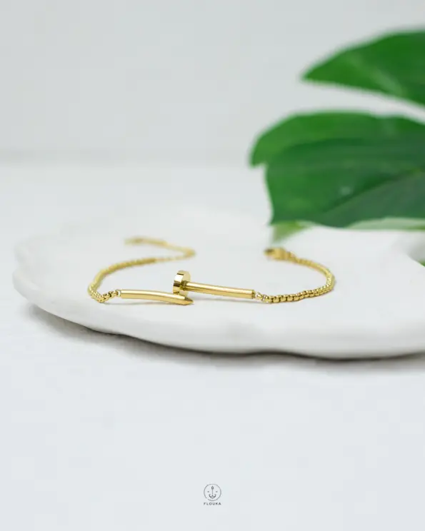 gold nail bracelet