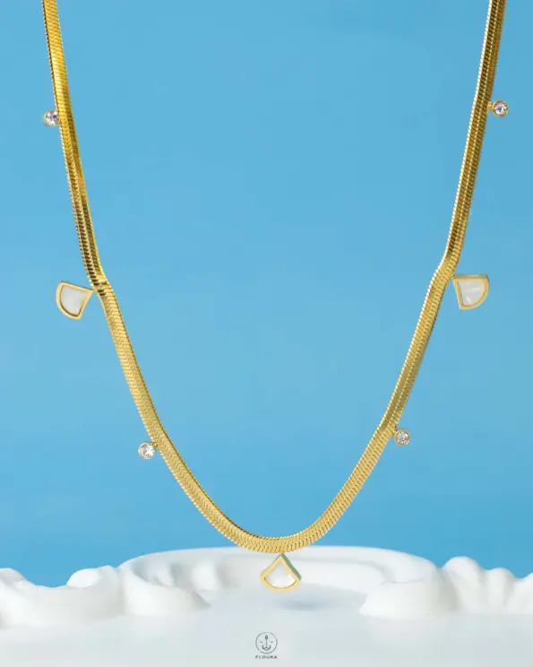 white & straus snake necklace