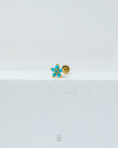 blue flower piercing