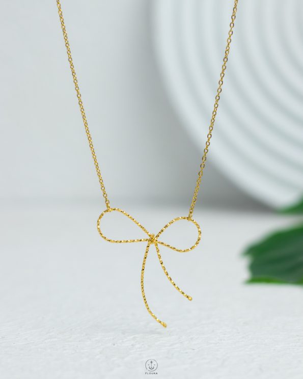 gold tie necklace