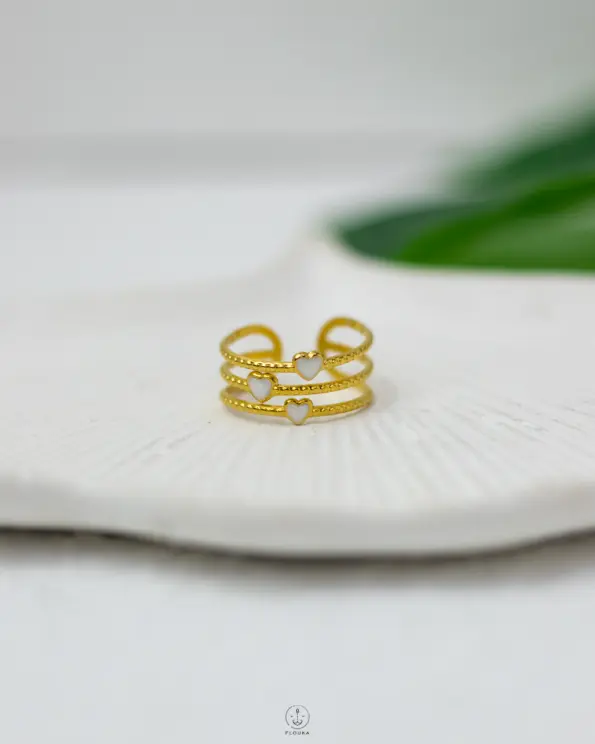 white rasin many hearts ring