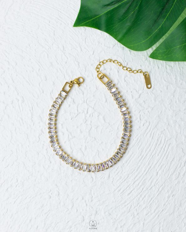 white straus gold bracelet