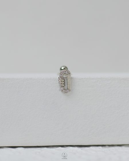 silver oval strus piercing