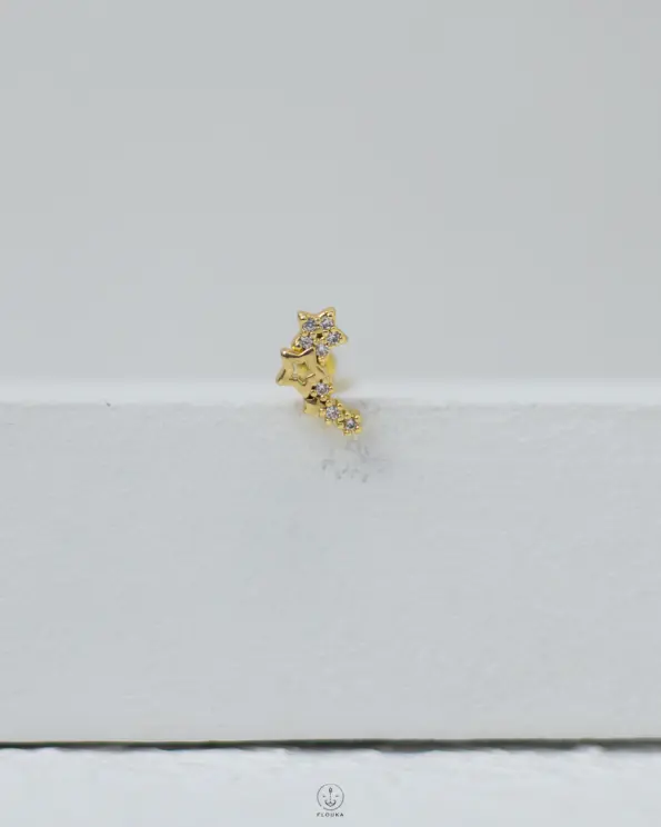 gold strus stars piercing