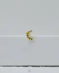 gold many color strus piercing