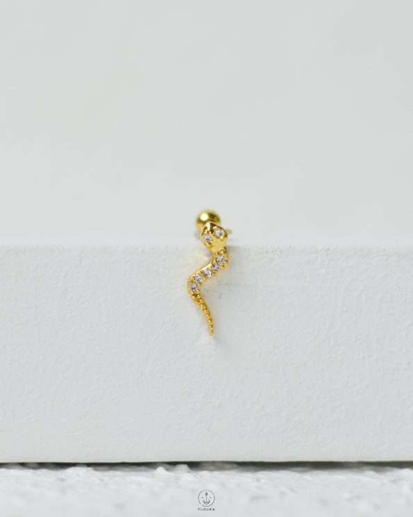 gold strus snake piercing