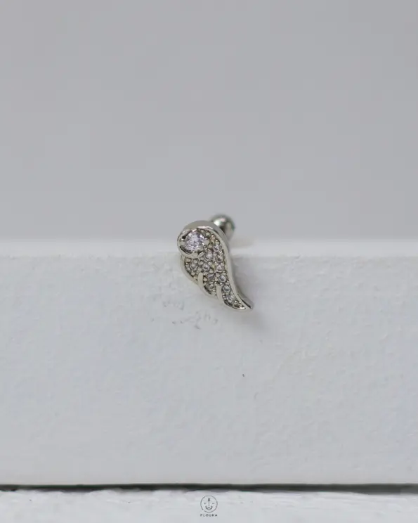 silver strus wing piercing