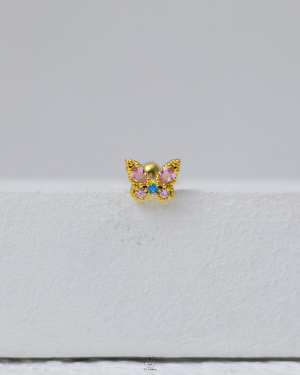 pink butterfly piercing