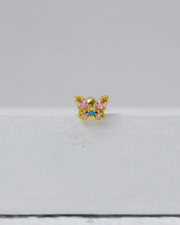 pink butterfly piercing