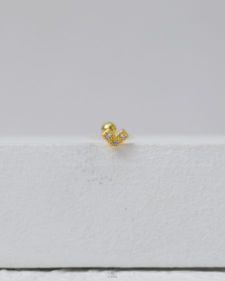 gold strus heart piercing