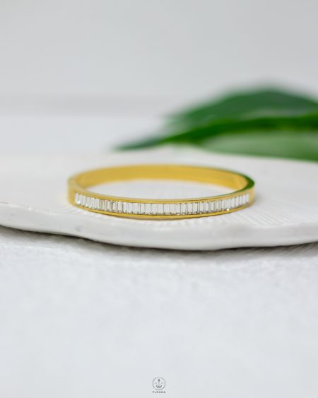 white straus gold bracelet