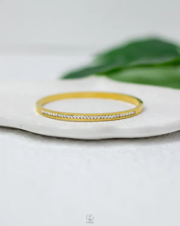 white straus gold bracelet