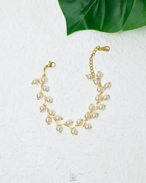 white fake peral bracelet