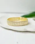 gold strus bracelet