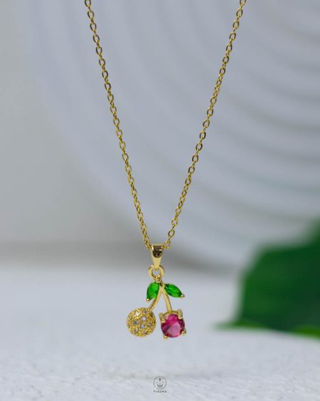 cherry pink strus gold necklace