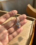 silver music sign necklace