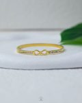 gold tie white struas bracelet