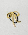 larg gold tie tokka