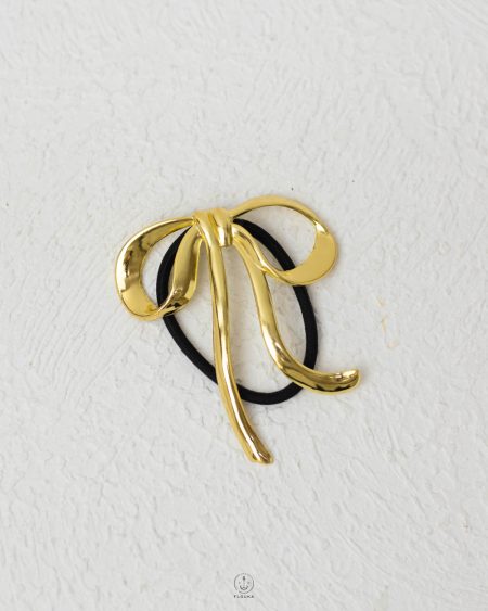 larg gold tie tokka