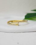 white struas gold nail bracelet