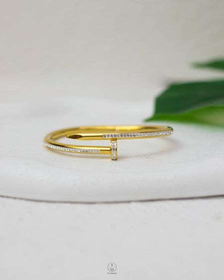 white struas gold nail bracelet
