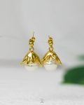 white beads gold earring